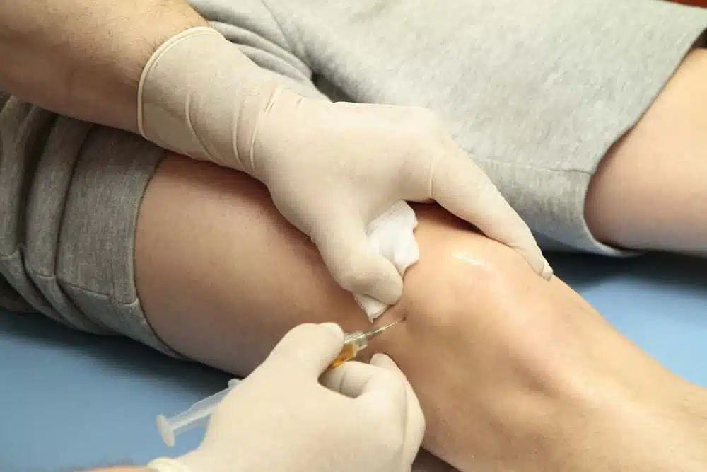 close up of joint injection on the knee