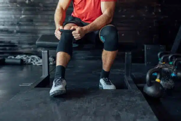 A man doing some strength training at the gym