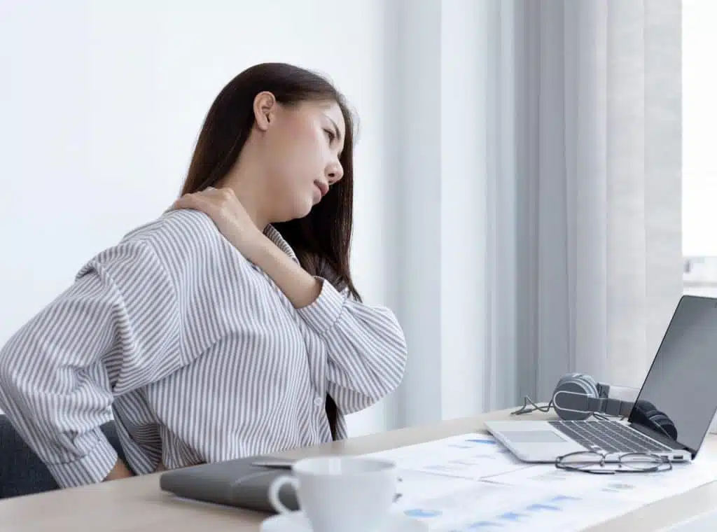 Woman suffers from body pain.